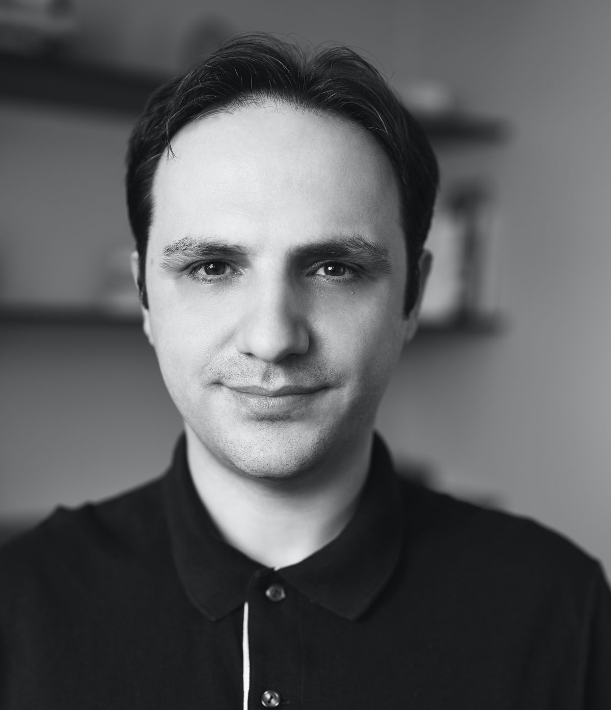 Omer Gunes, black and white close-up